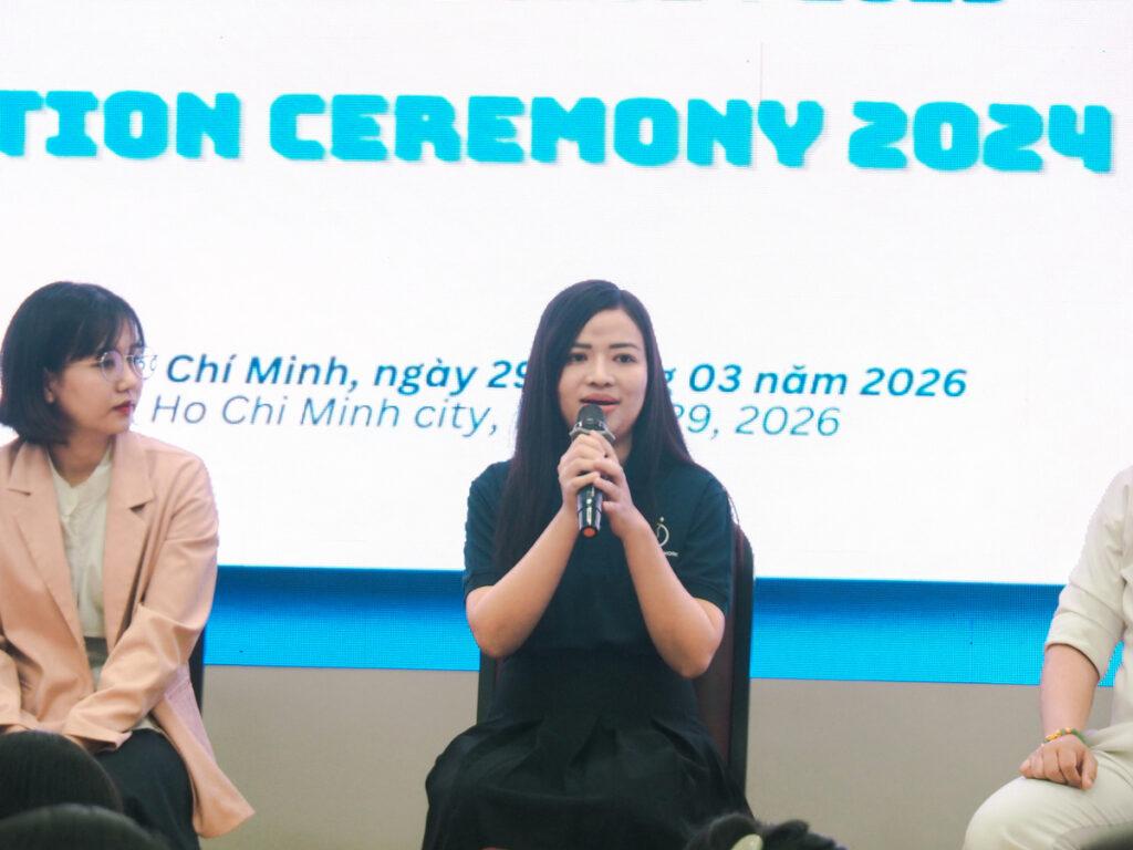 Thao at a graduation celebration for scholarship students, now as an alumna